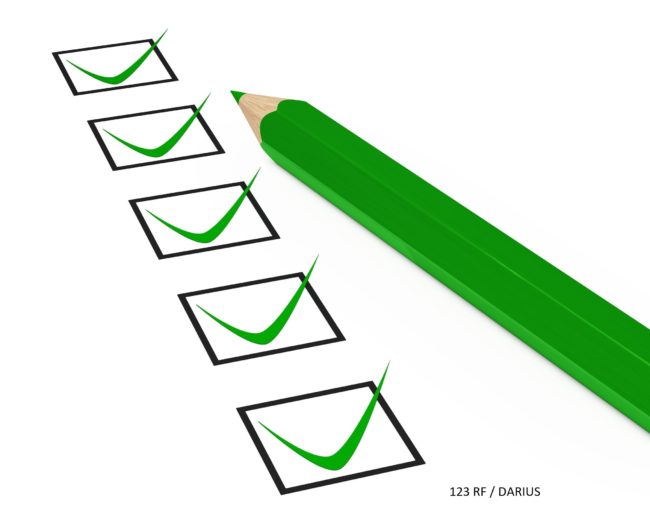 12978324 – green check box tick on white background