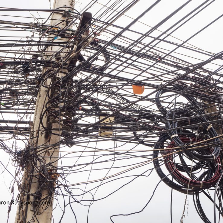 Chaos of cables and wires on electric pole in Chiang Mai,Thailan